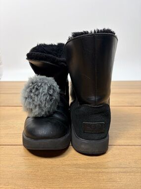 UGG Isley Black Leather Vibram Pom Pom Waterproof Boot Women's Size US7